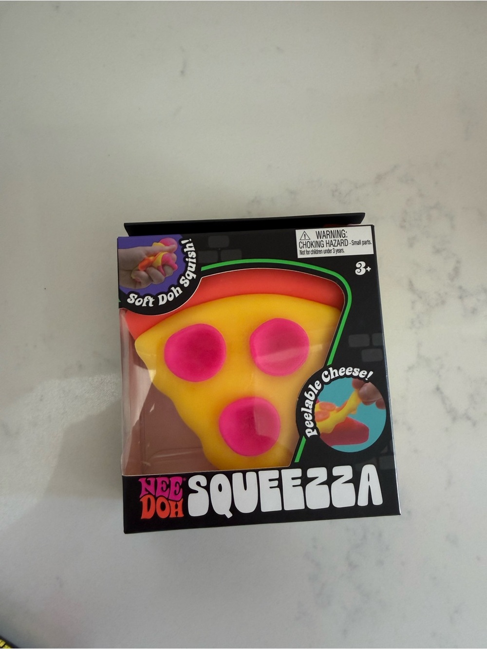 NeeDoh Squeeza Yellow & Pink Pizza with Orange crust.